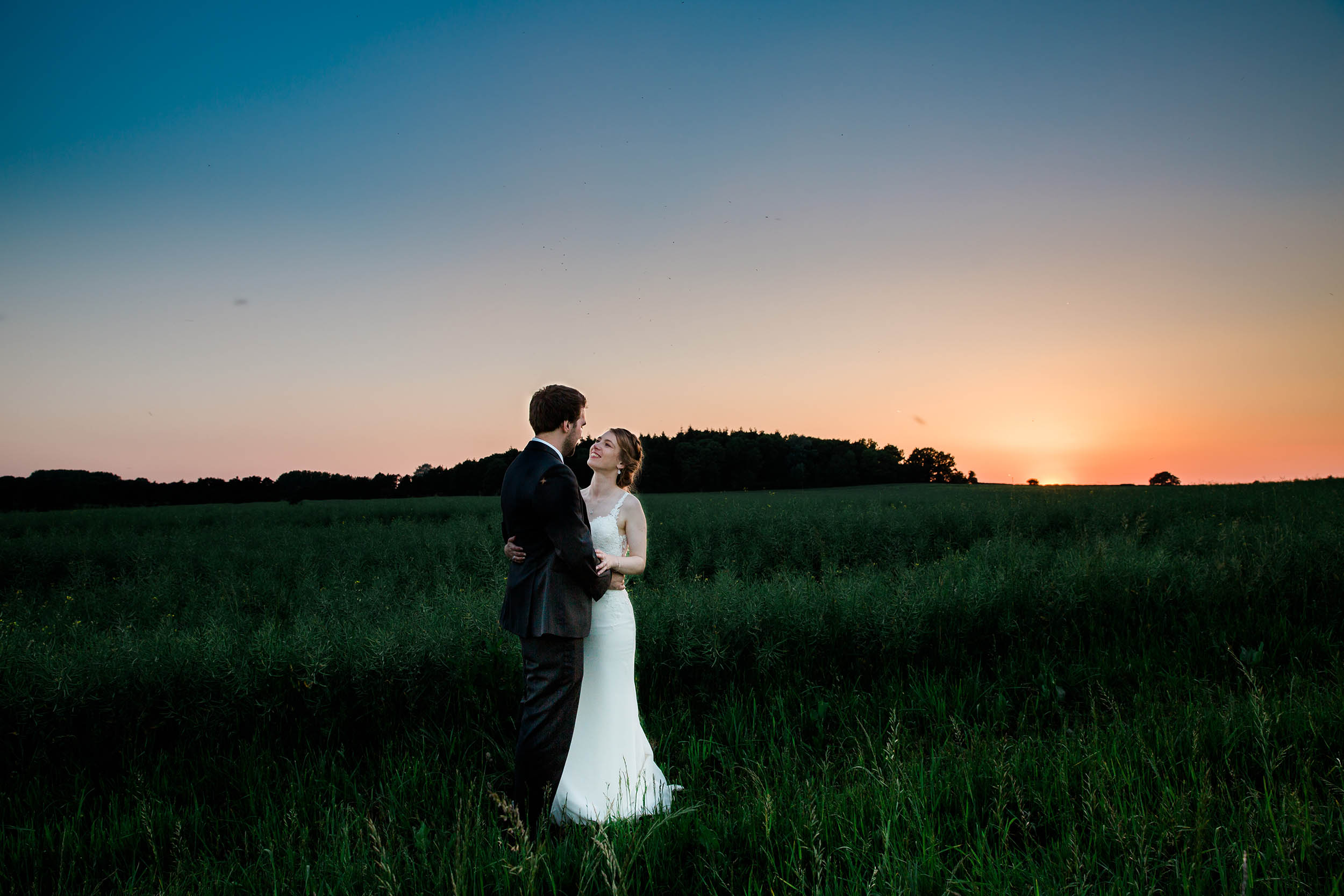 Modern Stylish Wedding at Swallows Nest Barn Couple Portrait Sunset